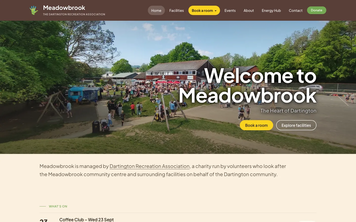 The Meadowbrook website homepage, showing the branding, the main navigation with room booking, and a hero photo of the site on a busy afternoon
